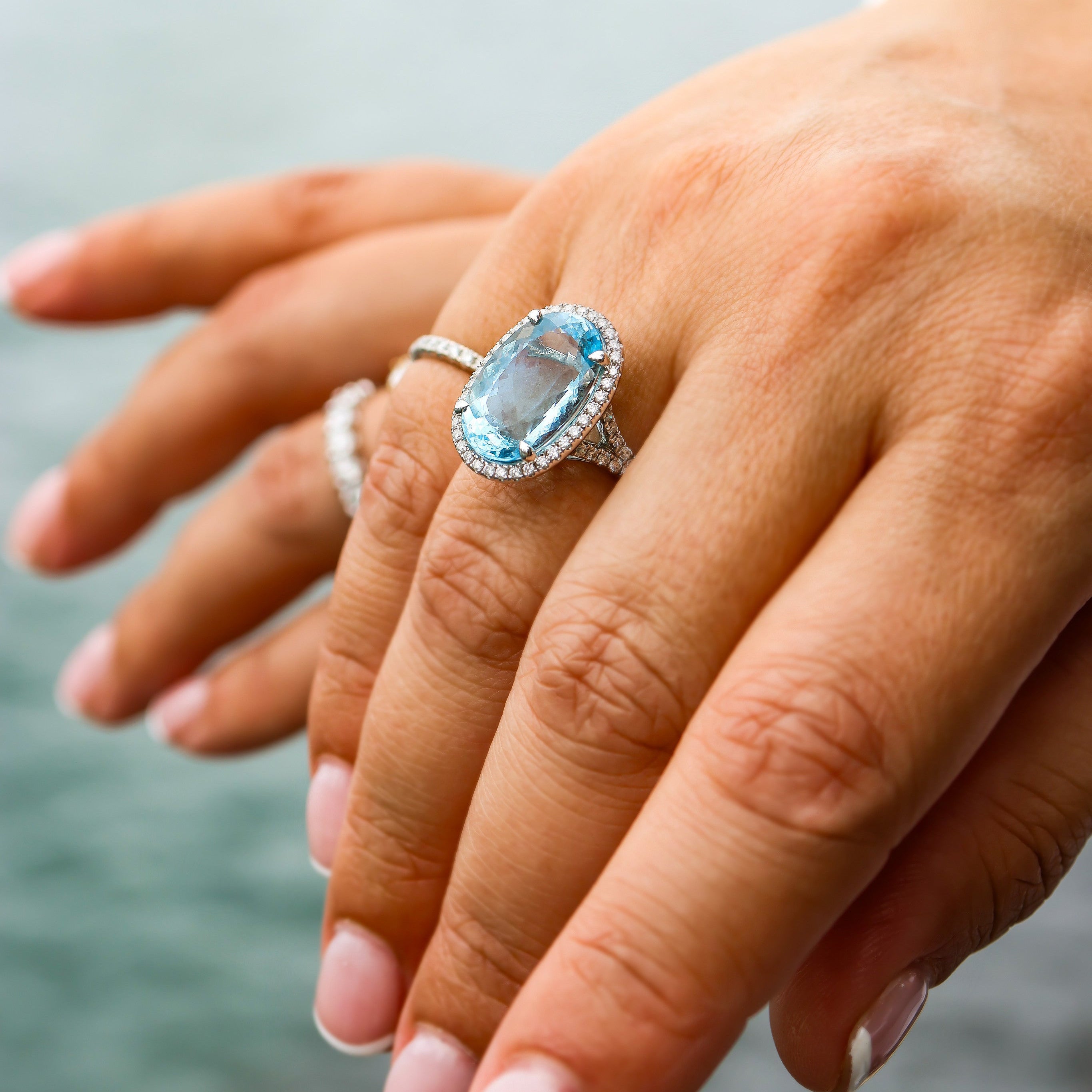 OVAL AQUAMARINE & DIAMOND RING
