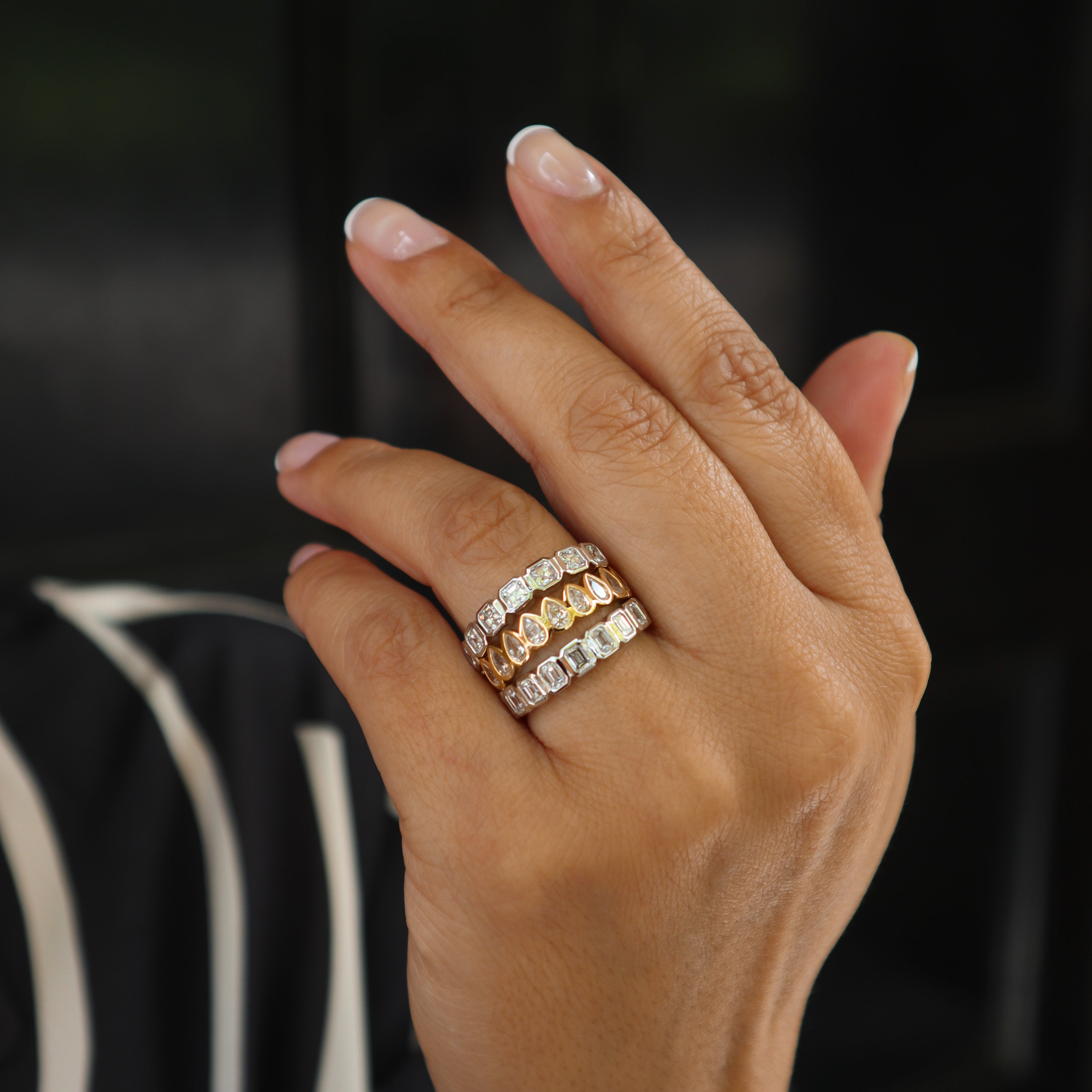 FLAT BEZEL ASSCHER CUT DIAMOND RING