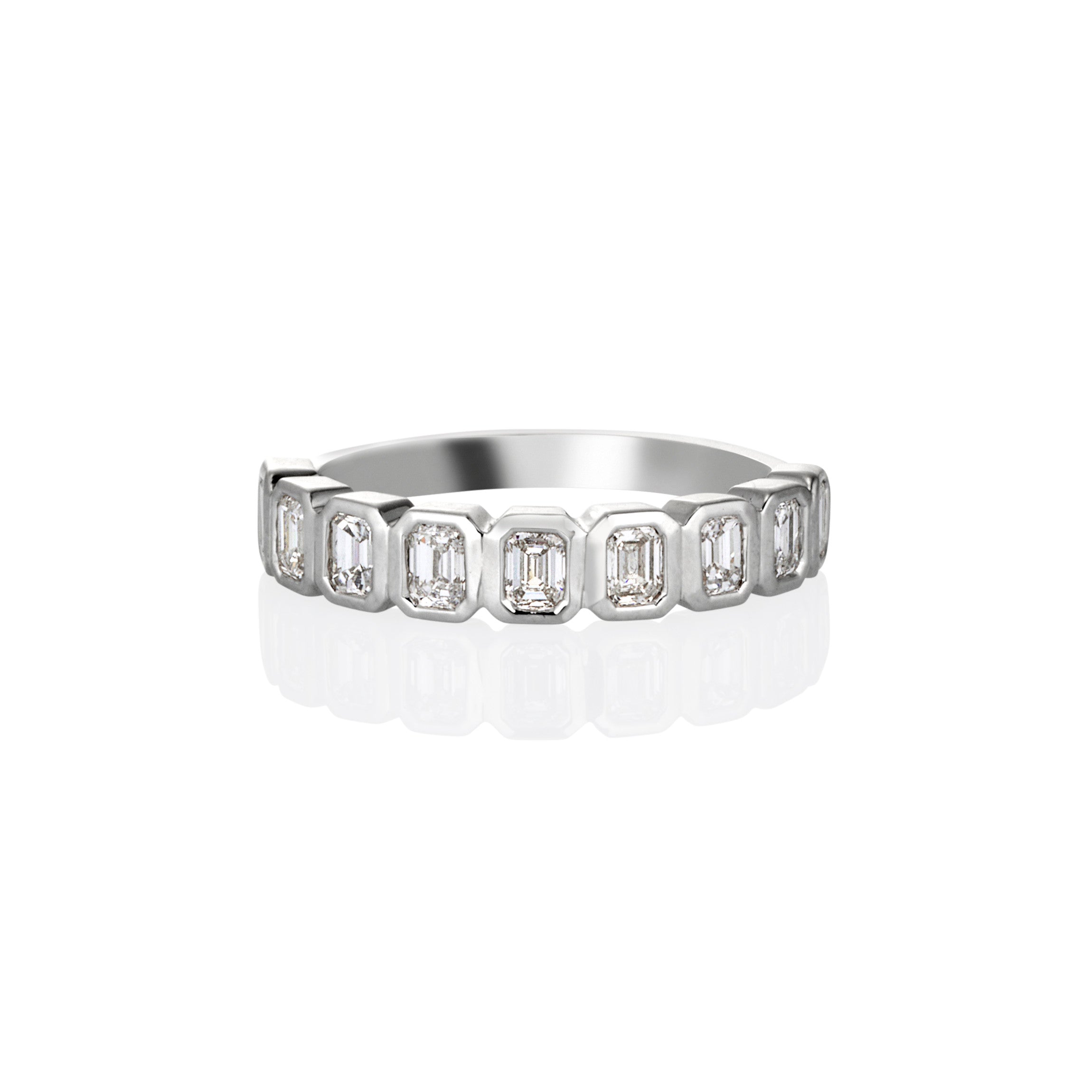 FLAT BEZEL EMERALD CUT DIAMOND RING