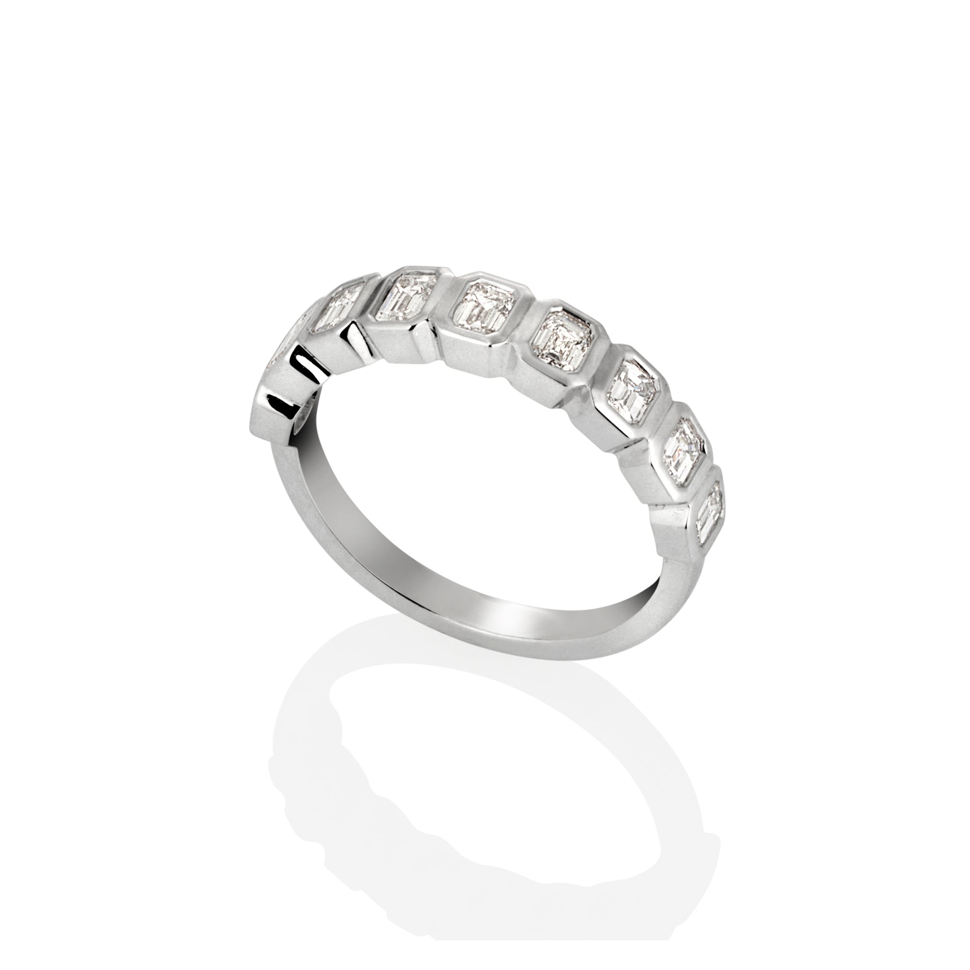 FLAT BEZEL EMERALD CUT DIAMOND RING