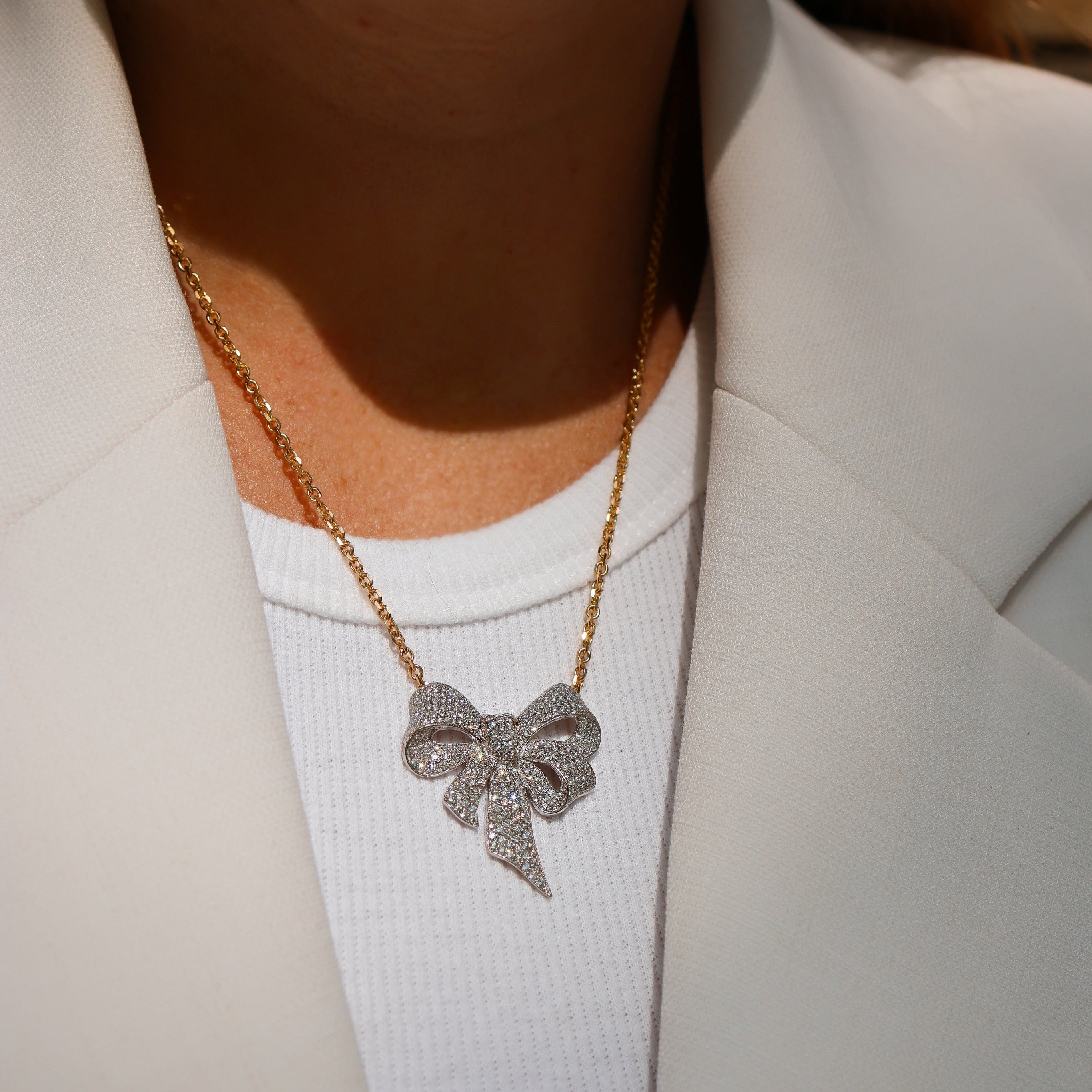 DIAMOND SET BOW PENDANT