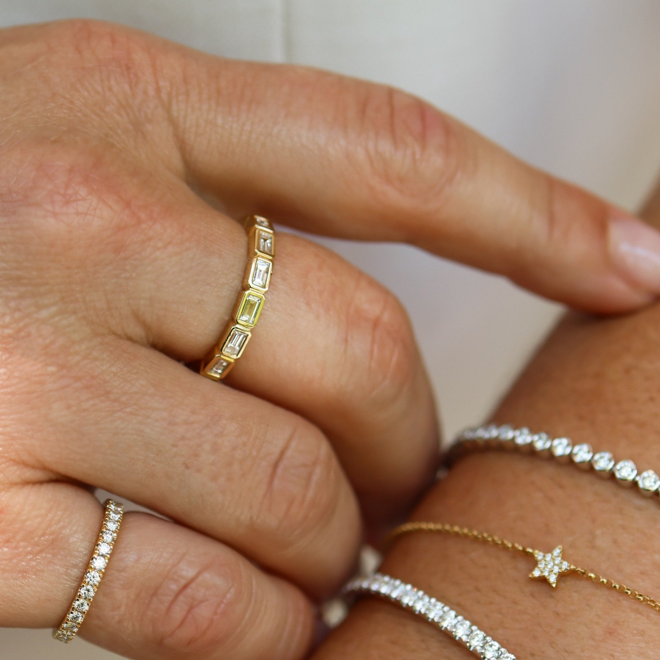 YELLOW GOLD BEZEL BAGUETTE RING