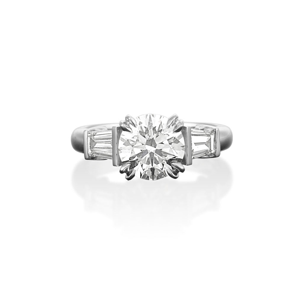 ROUND BRILLIANT & TAPERED BAGUETTE DIAMOND ENGAGEMENT RING