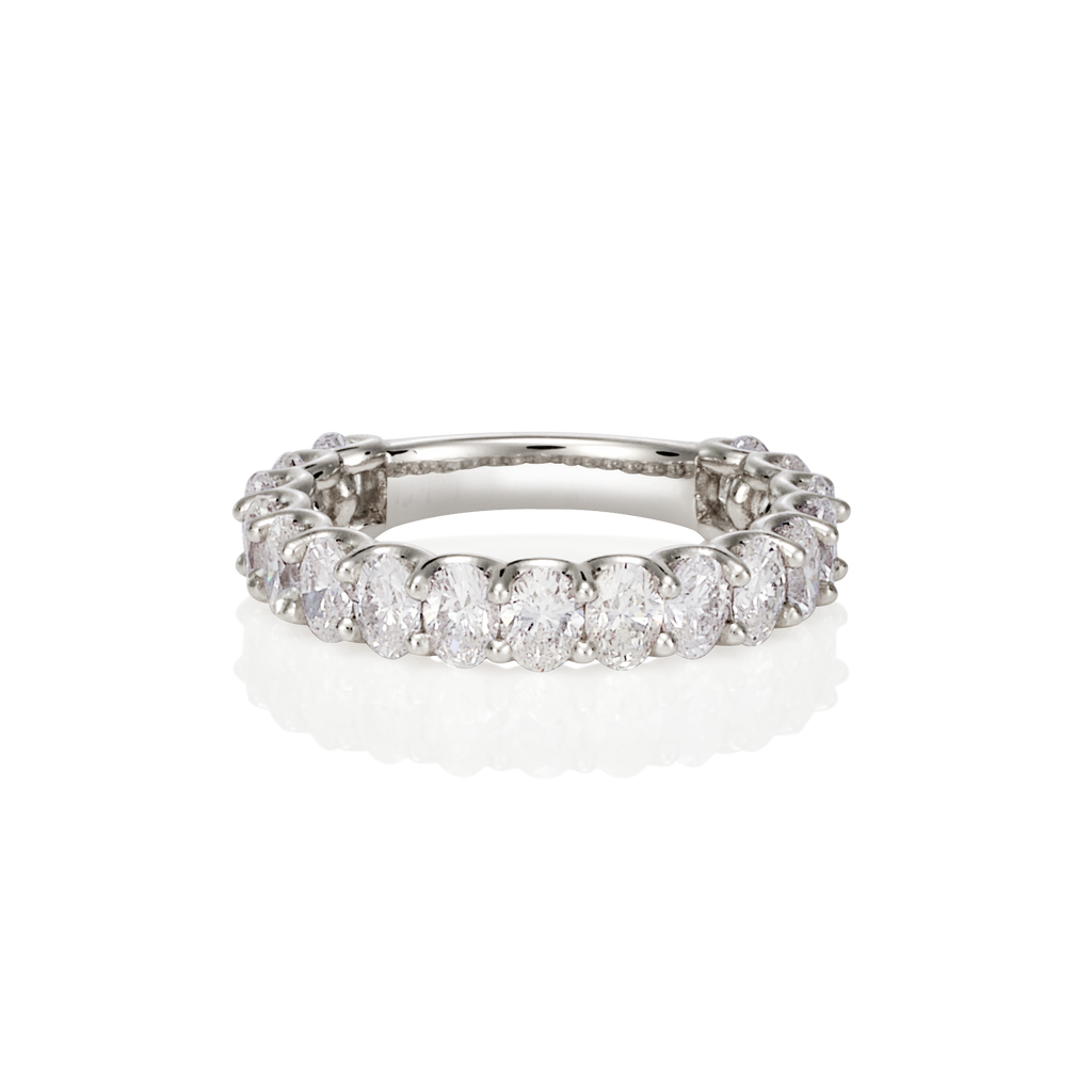 WHITE GOLD OVAL SHARED CLAW DIAMOND BAND