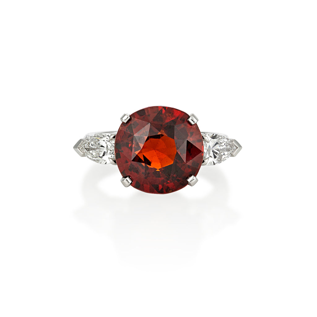 ROUND GARNET RING WITH TAPERED PEAR DIAMOND SHOULDERS