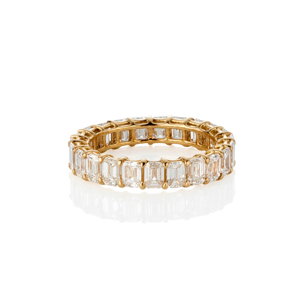 YELLOW GOLD SHARED CLAW EMERALD CUT ETERNITY RING 3.75CT