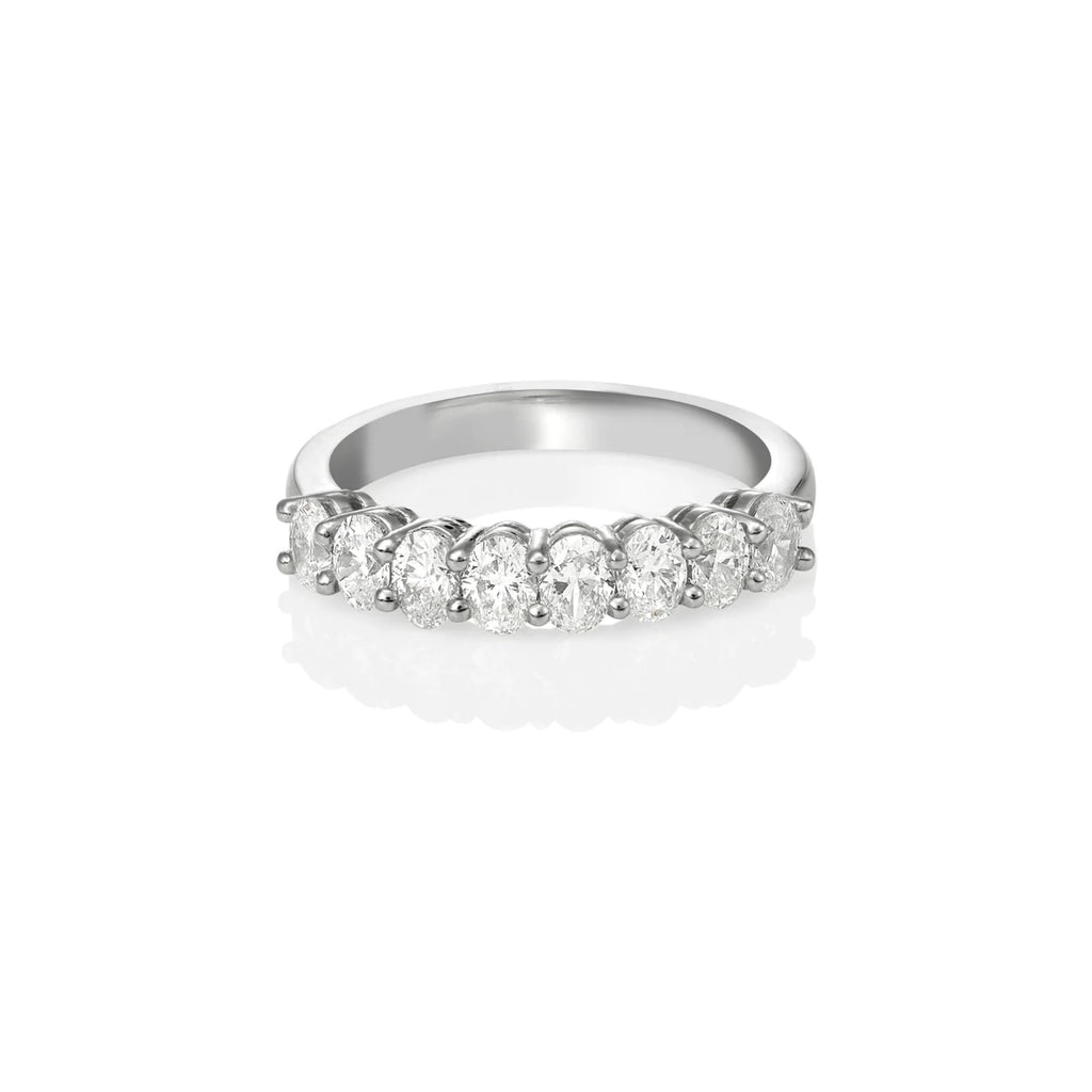 WHITE GOLD OVAL SHARED CLAW DIAMOND BAND 1.42ct