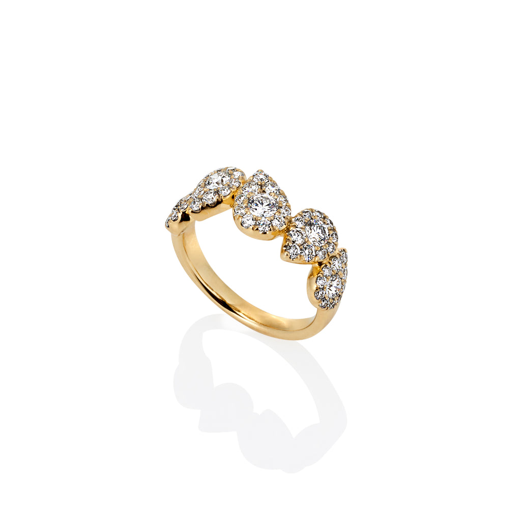side profile of an 18ct yellow gold ring with alternating pear shapes that have been set with diamonds